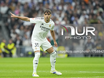 Raul Asencio centre-back of Real Madrid and Spain during the La Liga match between Real Madrid CF and CA Osasuna at Estadio Santiago Bernabe...