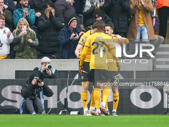 Pablo Sarabia of Wolves (right) receives congratulations for his goal during the Premier League match between Wolverhampton Wanderers and So...