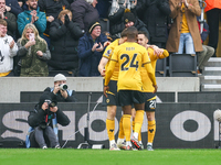 Pablo Sarabia of Wolves (right) receives congratulations for his goal during the Premier League match between Wolverhampton Wanderers and So...