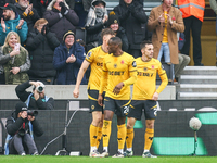 Pablo Sarabia of Wolves (right) with teammates following his goal during the Premier League match between Wolverhampton Wanderers and Southa...