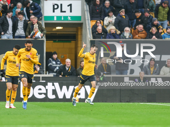 Pablo Sarabia of Wolves raises his hand in celebration following his goal during the Premier League match between Wolverhampton Wanderers an...