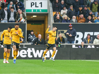 Pablo Sarabia of Wolves raises his hand in celebration following his goal during the Premier League match between Wolverhampton Wanderers an...