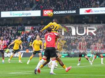 Number 24, Toti Gomes of Wolves, heads the ball during the Premier League match between Wolverhampton Wanderers and Southampton at Molineux...