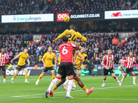 Number 24, Toti Gomes of Wolves, heads the ball during the Premier League match between Wolverhampton Wanderers and Southampton at Molineux...