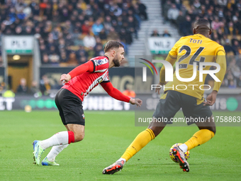 Adam Armstrong of Southampton is in attacking action during the Premier League match between Wolverhampton Wanderers and Southampton at Moli...