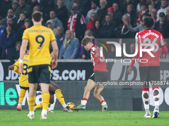 Tyler Dibling, number 33 of Southampton, is in attacking action during the Premier League match between Wolverhampton Wanderers and Southamp...