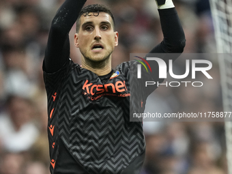 Sergio Herrera goalkeeper of Osasuna and Spain makes a save during the La Liga match between Real Madrid CF and CA Osasuna at Estadio Santia...