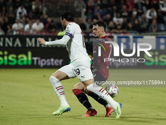 Nadir Zortea (#19 Cagliari Calcio) and Theo Hernandez (AC Milan) play during the Serie A TIM match between Cagliari Calcio and AC Milan in I...