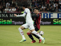 Nadir Zortea (#19 Cagliari Calcio) and Theo Hernandez (AC Milan) play during the Serie A TIM match between Cagliari Calcio and AC Milan in I...