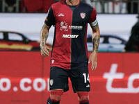 Alessandro Deiola (#14 Cagliari Calcio) participates in the Serie A TIM match between Cagliari Calcio and AC Milan in Italy on November 9, 2...