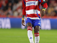 Martin Hongla of Granada CF participates in the LaLiga Hypermotion match between Granada CF and CD Eldense at Nuevo Los Carmenes Stadium in...