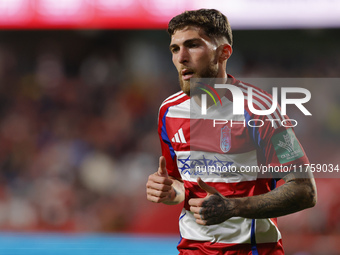 Giorgi Tsitaishvili of Granada CF plays during the LaLiga Hypermotion match between Granada CF and CD Eldense at Nuevo Los Carmenes Stadium...