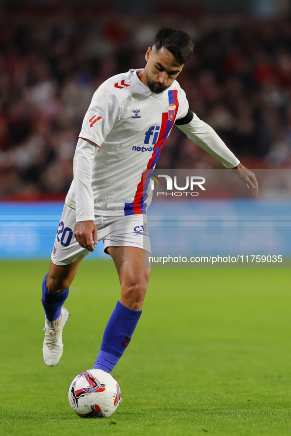 Ivan Chapela of CD Eldense plays during the LaLiga Hypermotion match between Granada CF and CD Eldense at Nuevo Los Carmenes Stadium in Gran...