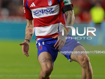 Giorgi Tsitaishvili of Granada CF plays during the LaLiga Hypermotion match between Granada CF and CD Eldense at Nuevo Los Carmenes Stadium...