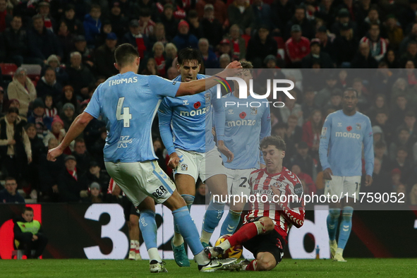 Sunderland's Trai Hume fouls Coventry City's Bobby Thomas during the Sky Bet Championship match between Sunderland and Coventry City at the...