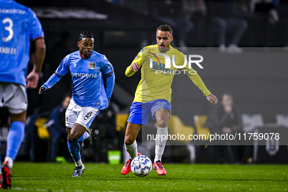 NEC forward Sontje Hansen and RKC defender Liam van Gelderen play during the match RKC - NEC at the Mandemakers Stadium in Waalwijk, Netherl...