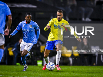 NEC forward Sontje Hansen and RKC defender Liam van Gelderen play during the match RKC - NEC at the Mandemakers Stadium in Waalwijk, Netherl...