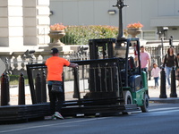 Security officials remove riot fences from around the White House complex in Washington, D.C., United States, on November 9, 2024. The fence...