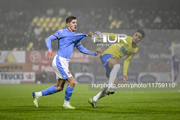 NEC midfielder Mees Hoedemakers and RKC midfielder Daouda Weidmann play during the match between RKC and NEC at the Mandemakers Stadium in W...