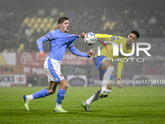 NEC midfielder Mees Hoedemakers and RKC midfielder Daouda Weidmann play during the match between RKC and NEC at the Mandemakers Stadium in W...