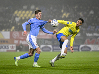 NEC midfielder Mees Hoedemakers and RKC midfielder Daouda Weidmann play during the match between RKC and NEC at the Mandemakers Stadium in W...