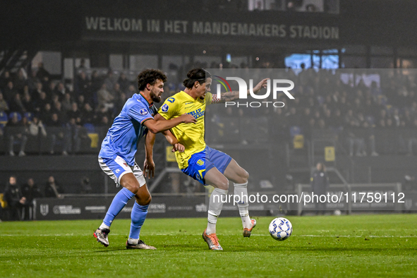 NEC defender Philippe Sandler and RKC forward Oskar Zawada play during the match RKC vs. NEC at the Mandemakers Stadium for the 2024-2025 se...