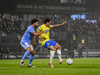 NEC defender Philippe Sandler and RKC forward Oskar Zawada play during the match RKC vs. NEC at the Mandemakers Stadium for the 2024-2025 se...