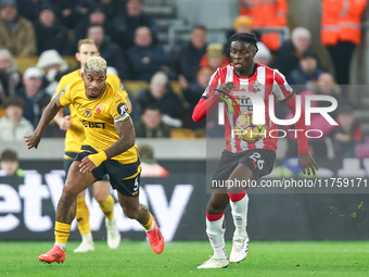 Mario Lemina of Wolves and Lesley Ugochukwu of Southampton fight for possession during the Premier League match between Wolverhampton Wander...