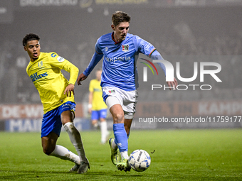 RKC forward Richonell Margaret and NEC midfielder Mees Hoedemakers play during the match between RKC and NEC at the Mandemakers Stadium in W...