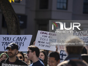 On November 9, 2024, in Washington, D.C., outside the Heritage Foundation, an anti-Project 2025 protest takes place. Hundreds of people gath...