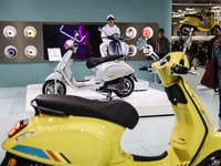 A general view of a motorcycle display at the Vespa Piaggio stand during the 110th edition of EICMA Milan Motorcycle Show at Rho Fiera Milan...