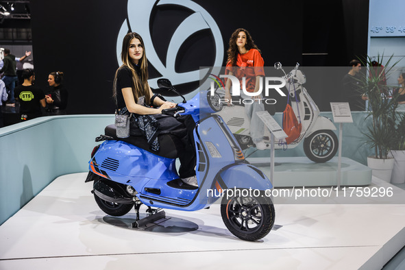 A general view of a motorcycle display at the Vespa Piaggio stand during the 110th edition of EICMA Milan Motorcycle Show at Rho Fiera Milan...