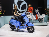 A general view of a motorcycle display at the Vespa Piaggio stand during the 110th edition of EICMA Milan Motorcycle Show at Rho Fiera Milan...