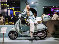 A general view of a motorcycle display at the Vespa Piaggio stand during the 110th edition of EICMA Milan Motorcycle Show at Rho Fiera Milan...