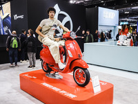 A general view of a motorcycle display at the Vespa Piaggio stand during the 110th edition of EICMA Milan Motorcycle Show at Rho Fiera Milan...