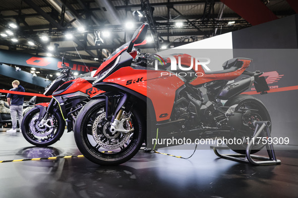 A general view of a motorcycle display at the QJ Motor stand during the 110th edition of EICMA Milan Motorcycle Show at Rho Fiera Milano in...