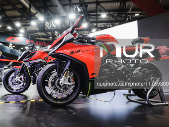 A general view of a motorcycle display at the QJ Motor stand during the 110th edition of EICMA Milan Motorcycle Show at Rho Fiera Milano in...