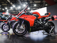 A general view of a motorcycle display at the QJ Motor stand during the 110th edition of EICMA Milan Motorcycle Show at Rho Fiera Milano in...