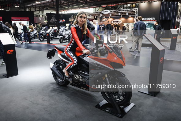 A general view of a motorcycle display at the QJ Motor stand during the 110th edition of EICMA Milan Motorcycle Show at Rho Fiera Milano in...