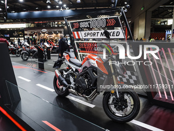 A general view of a motorcycle display at the QJ Motor stand during the 110th edition of EICMA Milan Motorcycle Show at Rho Fiera Milano in...