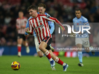 Dennis Cirkin runs with the ball during the Sky Bet Championship match between Sunderland and Coventry City at the Stadium Of Light in Sunde...