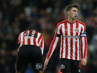 Sunderland's Wilson Isidor (left) and Sunderland's Dan Neil (right) show dejection at full time during the Sky Bet Championship match betwee...