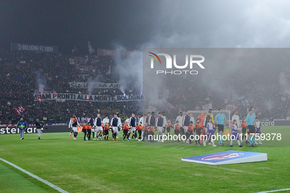 Players and match officials make their way out into the pitch during the UEFA Champions League 2024/25 League Phase MD4 match between Bologn...