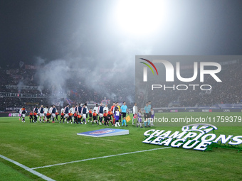 Players and match officials make their way out into the pitch during the UEFA Champions League 2024/25 League Phase MD4 match between Bologn...