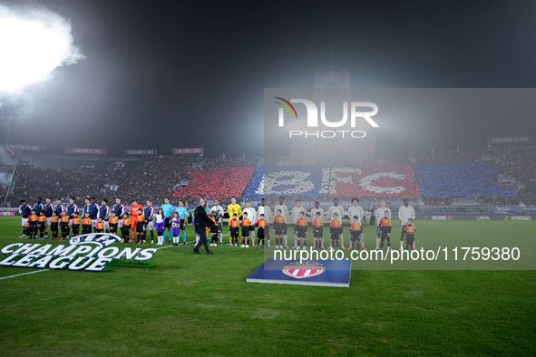 Bologna FC and AS Monaco players line up on the pitch prior the UEFA Champions League 2024/25 League Phase MD4 match between Bologna FC and...