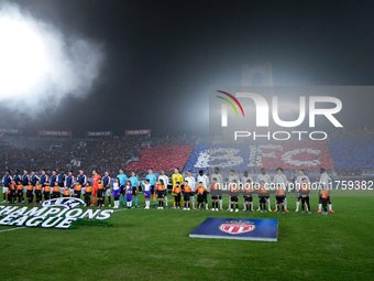 Bologna FC and AS Monaco players line up on the pitch prior the UEFA Champions League 2024/25 League Phase MD4 match between Bologna FC and...