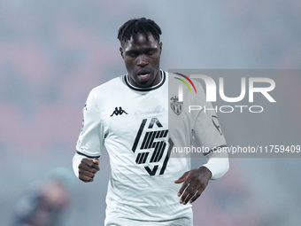 Wilfried Singo of AS Monaco looks dejected during the UEFA Champions League 2024/25 League Phase MD4 match between Bologna FC and AS Monaco...