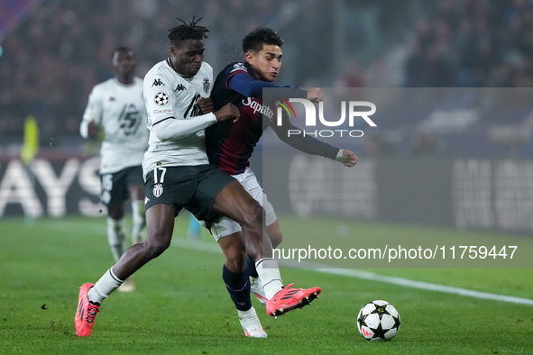 Wilfried Singo of AS Monaco and Santiago Castro of Bologna FC compete for the ball during the UEFA Champions League 2024/25 League Phase MD4...