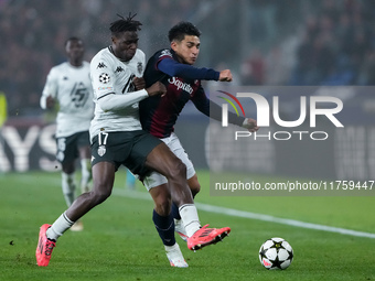 Wilfried Singo of AS Monaco and Santiago Castro of Bologna FC compete for the ball during the UEFA Champions League 2024/25 League Phase MD4...