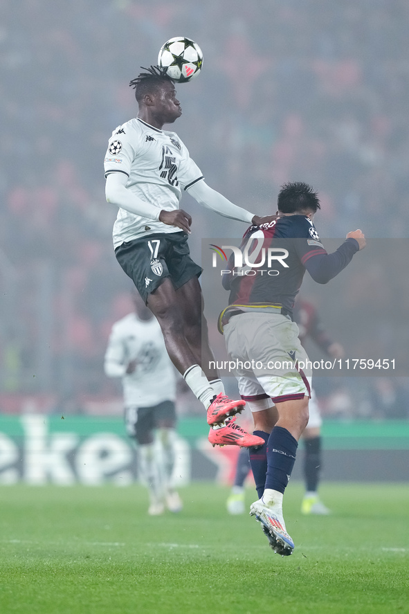 Wilfried Singo of AS Monaco and Santiago Castro of Bologna FC jump for the ball during the UEFA Champions League 2024/25 League Phase MD4 ma...